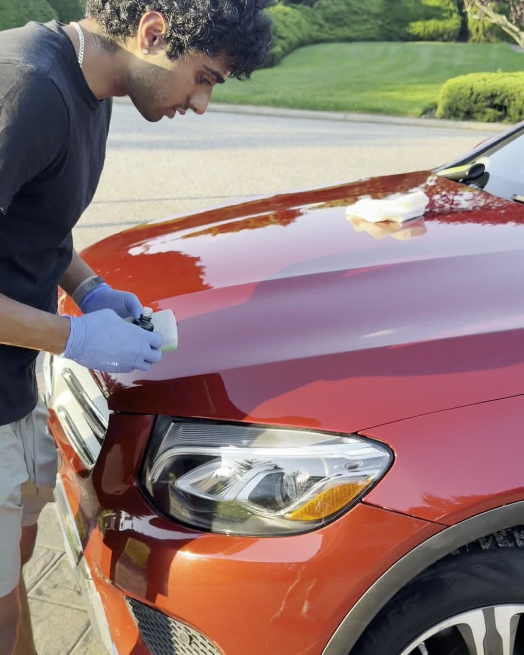 Stej applying Gyeon ceramic coating to a Mercedes GLC hood